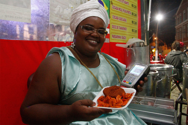 Cláudia Assis, filha de Dinha do Acarajé.