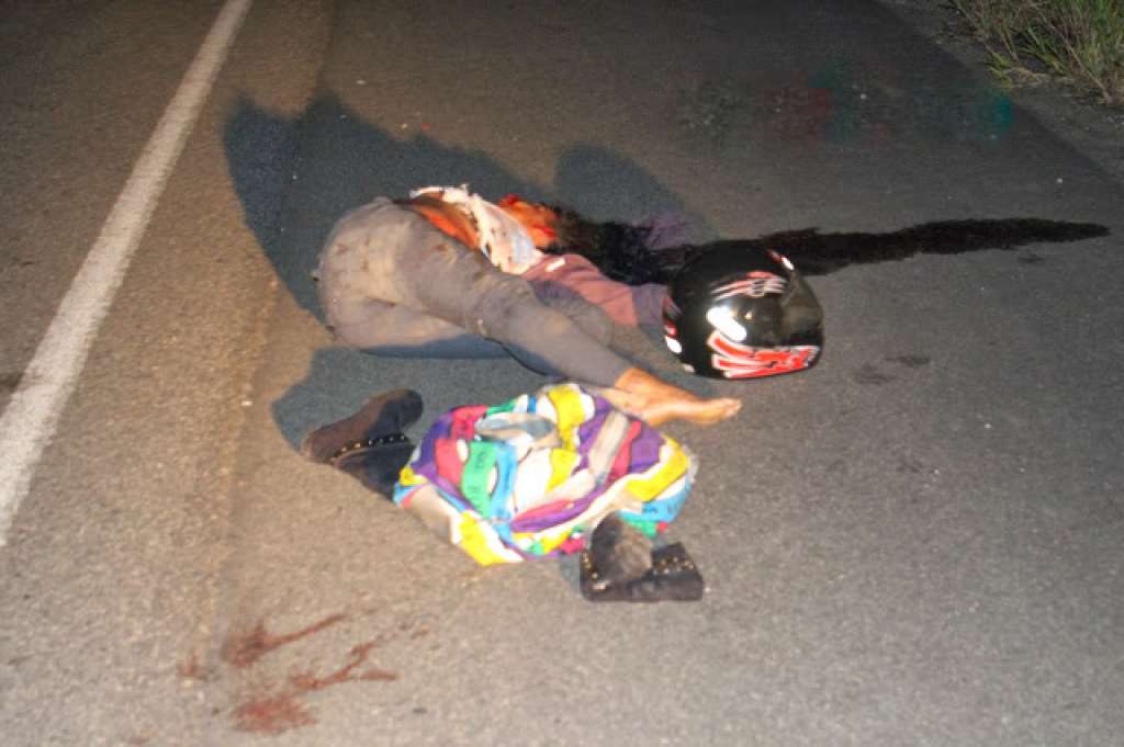 Imagens Fortes: Mulher é morre após ser arrastada por caminhão