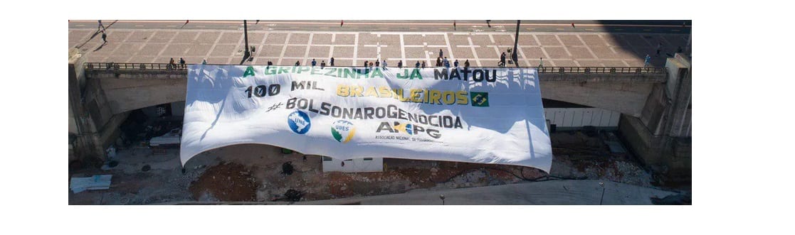 Covid-19:”Bolsonaro Genocida”, diz faixa de protesto pelos mais de 100 mil mortos no BR