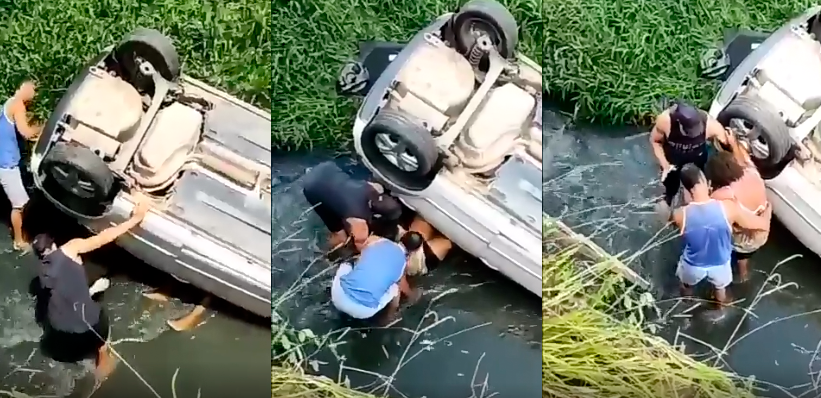 Vídeo: Populares resgatam mulher após seu carro capotar em córrego de Salvador