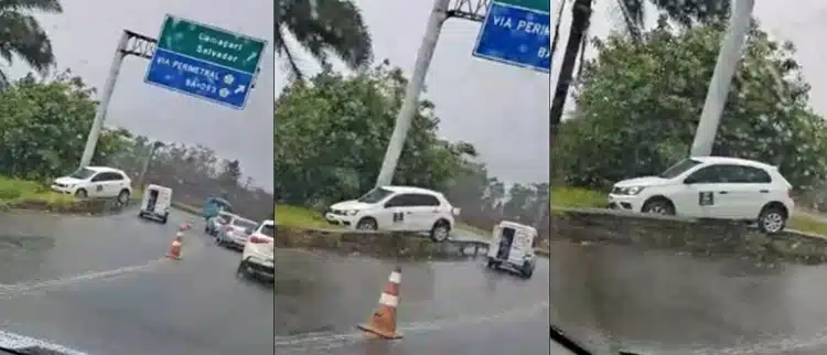 VÍDEO: Carro fica preso em cima de defensa metálica na Rotatória da Ford