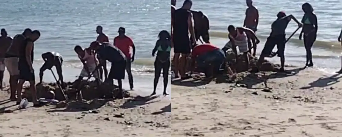 Blogueiro se ‘enterra’ em praia de Salvador e fica preso na areia