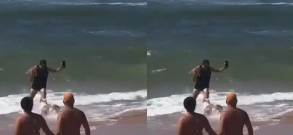 Homem salva cachorro de ser atacado por pitbull na praia de Jauá